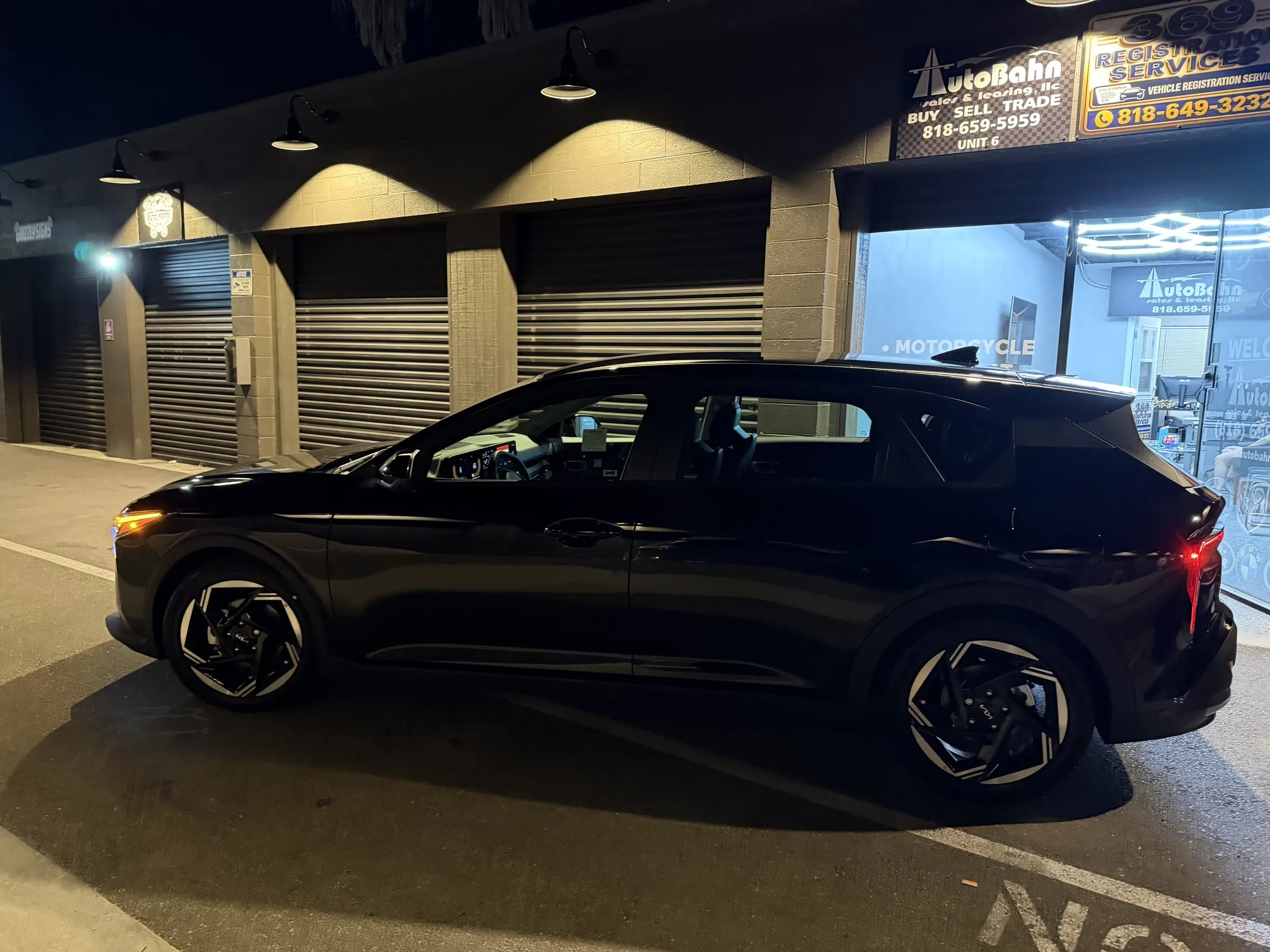 Kia K4, side view, delivered by AutoBahn Sales & Leasing
